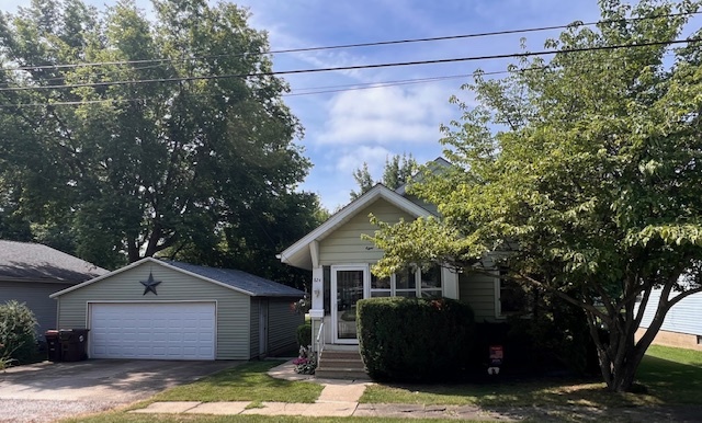 824 East Adams Street Clinton, IL 61727 - Photo 3 of 11 a view of a house with a garage