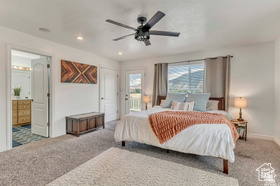 19 East Southfield Road Spanish Fork, UT 84660 - Photo 71 of 74 Bedroom featuring carpet flooring, access to exterior, a ceiling fan, ensuite bathroom, and recessed lighting