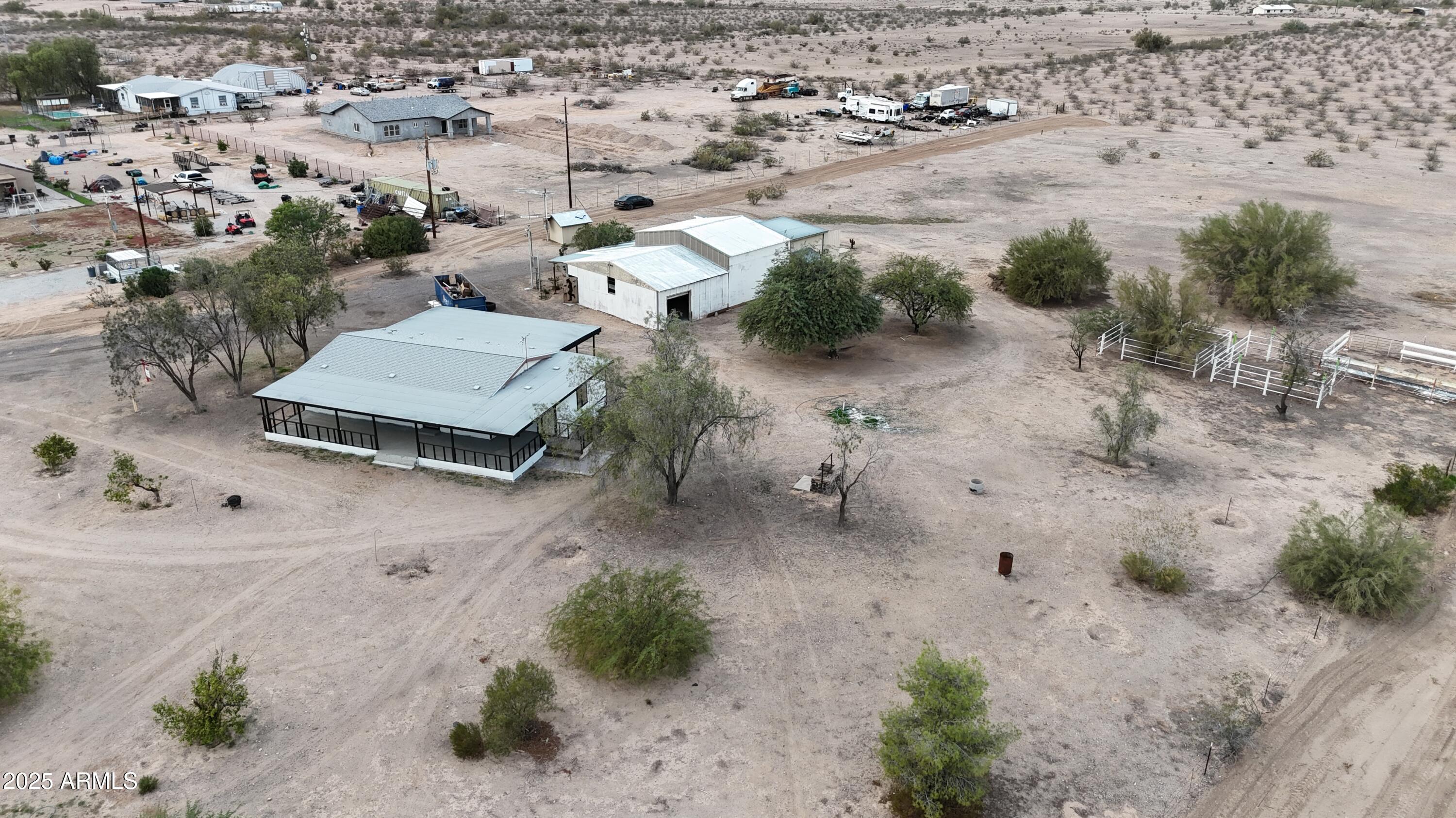 34040 West Lower Buckeye Road Tonopah, AZ 85354 - Photo 2 of 45 an aerial view of a houses with beach