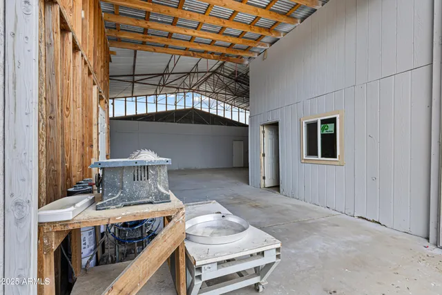 a room with a couch and a window