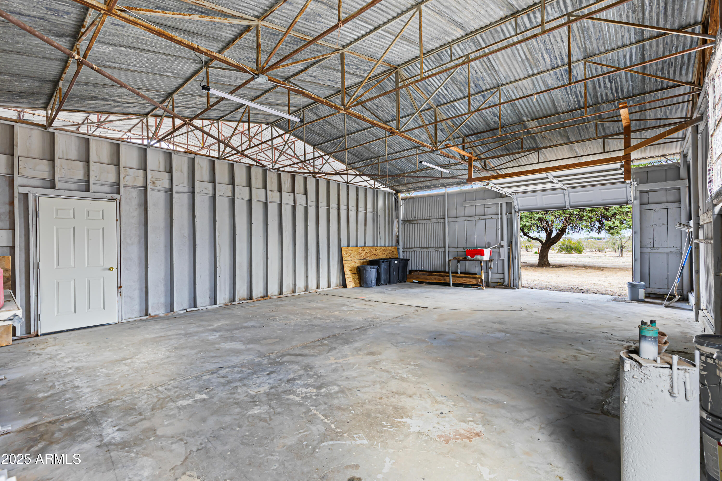 34040 West Lower Buckeye Road Tonopah, AZ 85354 - Photo 38 of 45 a view of a room with wooden walls