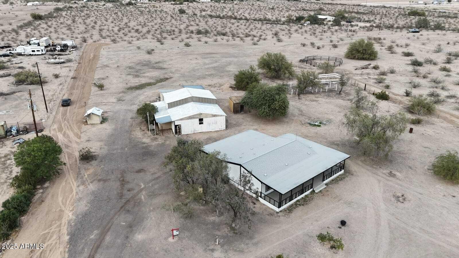 34040 West Lower Buckeye Road Tonopah, AZ 85354 - Photo 6 of 45 an aerial view of a house with a yard