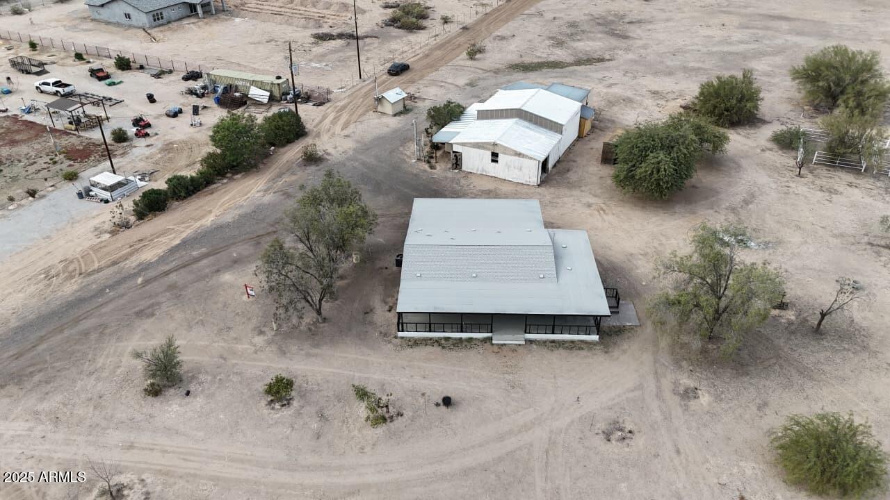 34040 West Lower Buckeye Road Tonopah, AZ 85354 - Photo 7 of 45 an aerial view of a house with a yard