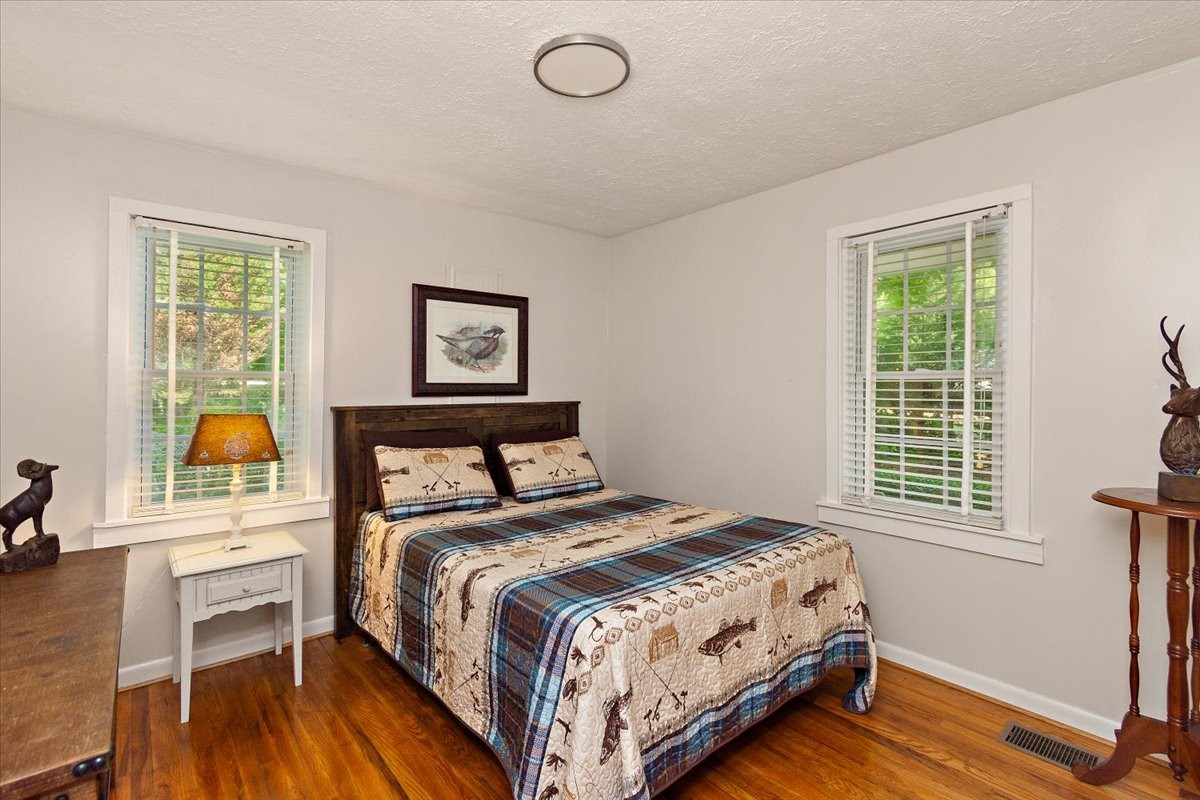 1570 Wolf Creek Road Silver Point, TN 38582 - Photo 13 of 40 a bedroom with a bed and a window