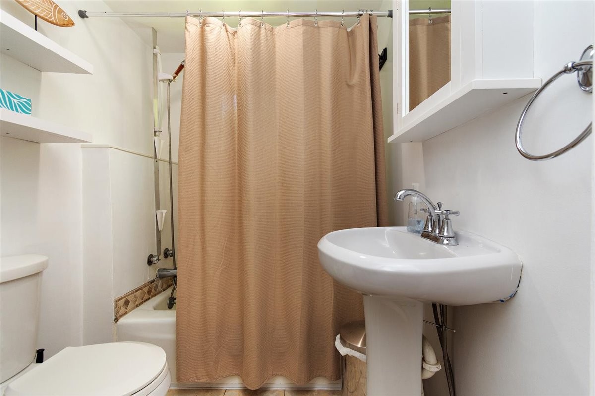 1570 Wolf Creek Road Silver Point, TN 38582 - Photo 16 of 40 a bathroom with a sink toilet