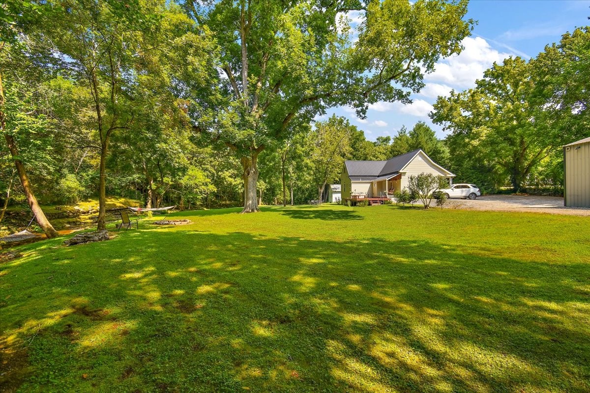1570 Wolf Creek Road Silver Point, TN 38582 - Photo 25 of 40 a view of yard with green space and garden
