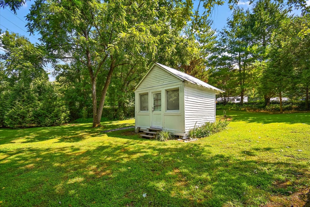 1570 Wolf Creek Road Silver Point, TN 38582 - Photo 29 of 40 a view of a house with a yard