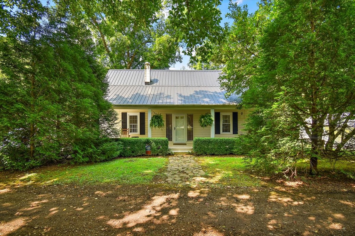 1570 Wolf Creek Road Silver Point, TN 38582 - Photo 3 of 40 a view of a house with a yard