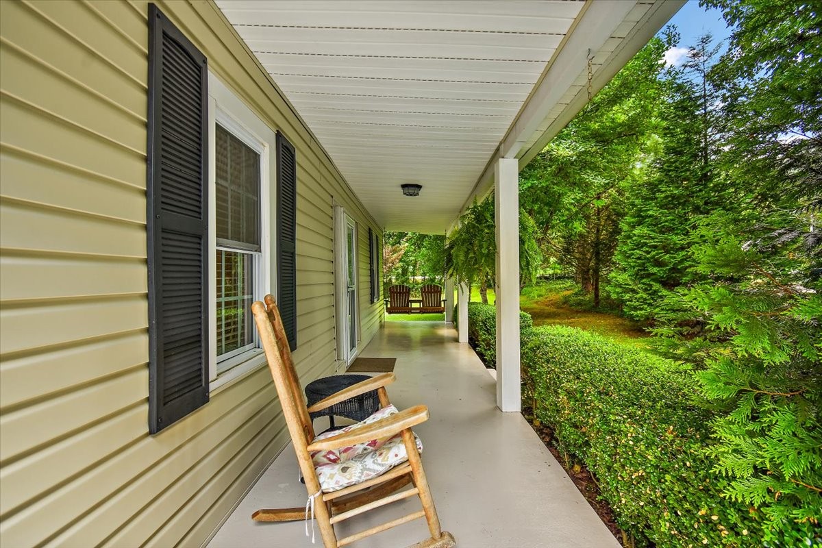1570 Wolf Creek Road Silver Point, TN 38582 - Photo 5 of 40 a backyard of a house with seating space