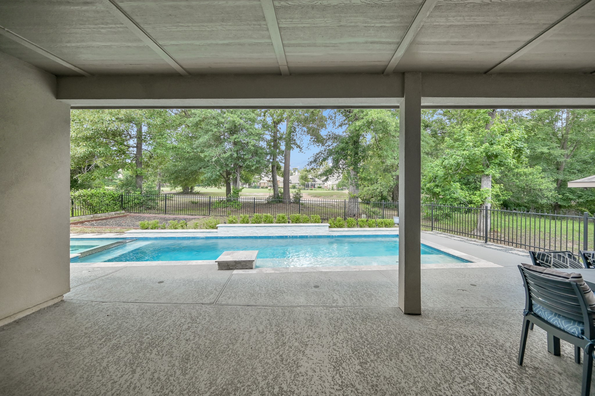 4792 West Fork Boulevard Conroe, TX 77304 - Photo 31 of 42 Texas size covered porch.