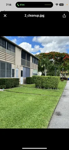 a view of a yard with an outdoor space