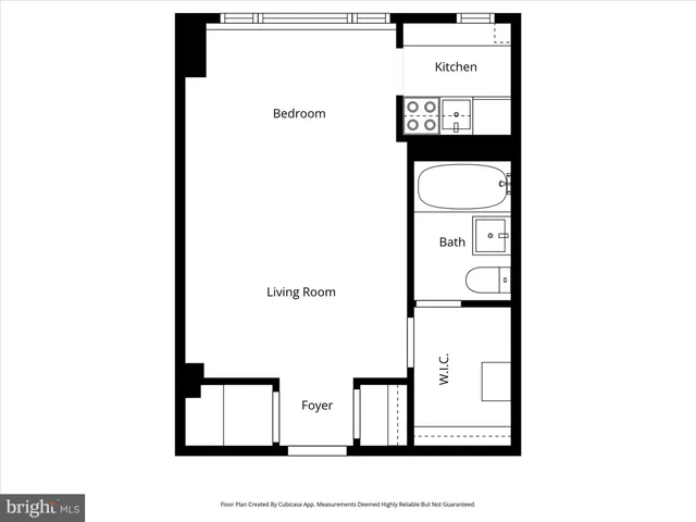 a view of walk in closet with clothes