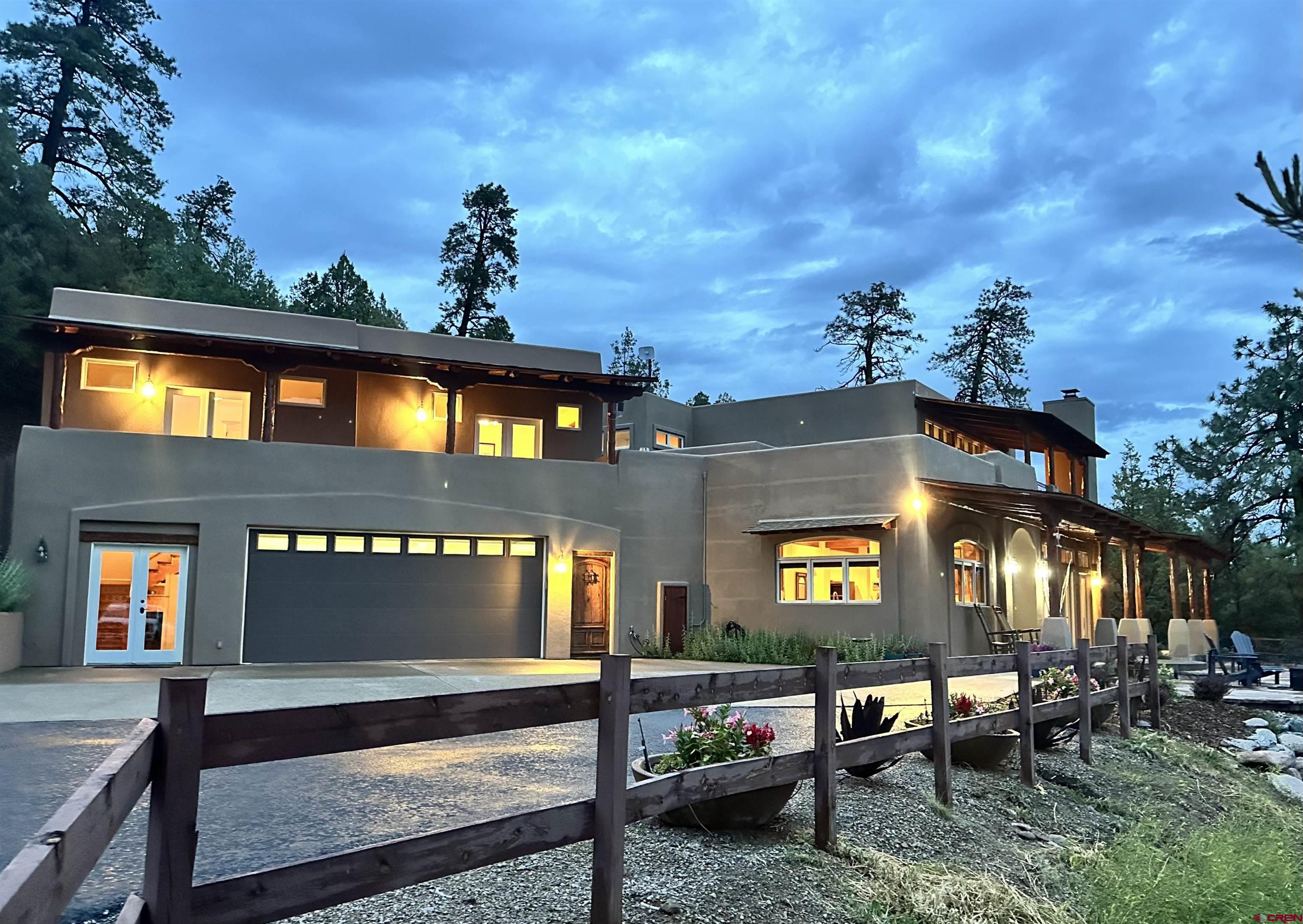 a view of a cafe with sitting area