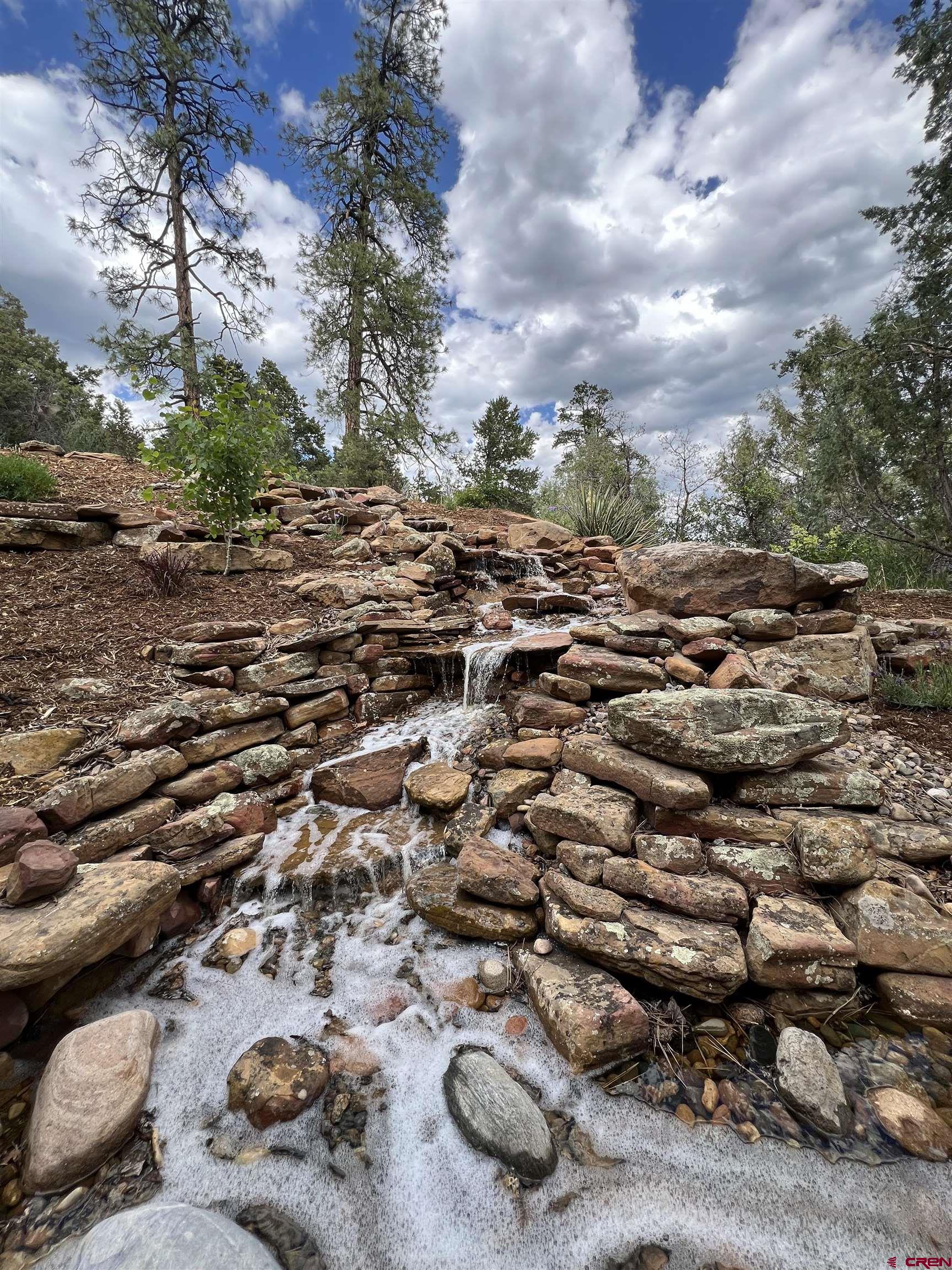 4365 County Road 237 Durango, CO 81301 - Photo 26 of 35 an aerial view of residential houses with outdoor space