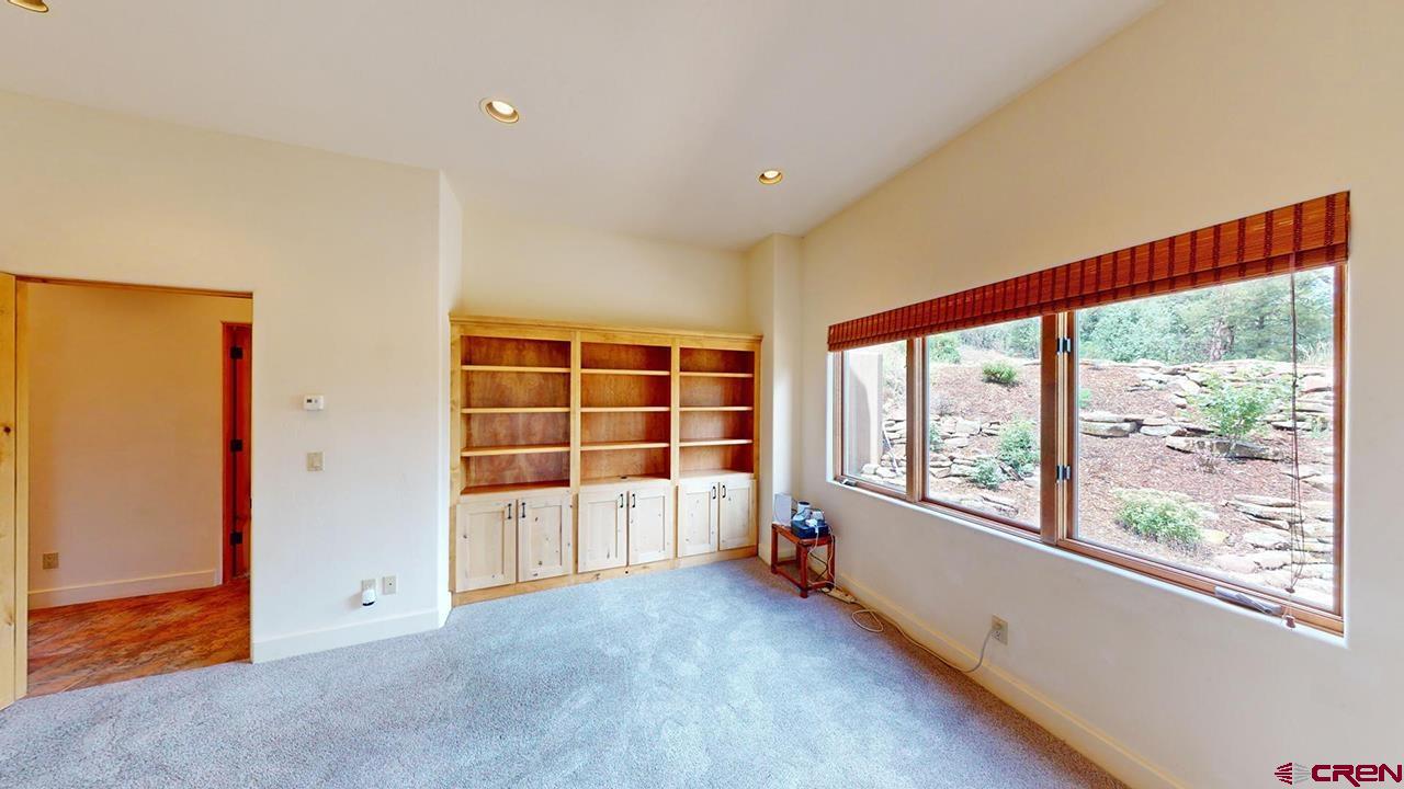 4365 County Road 237 Durango, CO 81301 - Photo 8 of 35 an empty room with windows and view of wooden floor