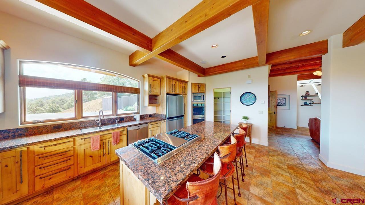 4365 County Road 237 Durango, CO 81301 - Photo 9 of 35 a living room with furniture and a large window