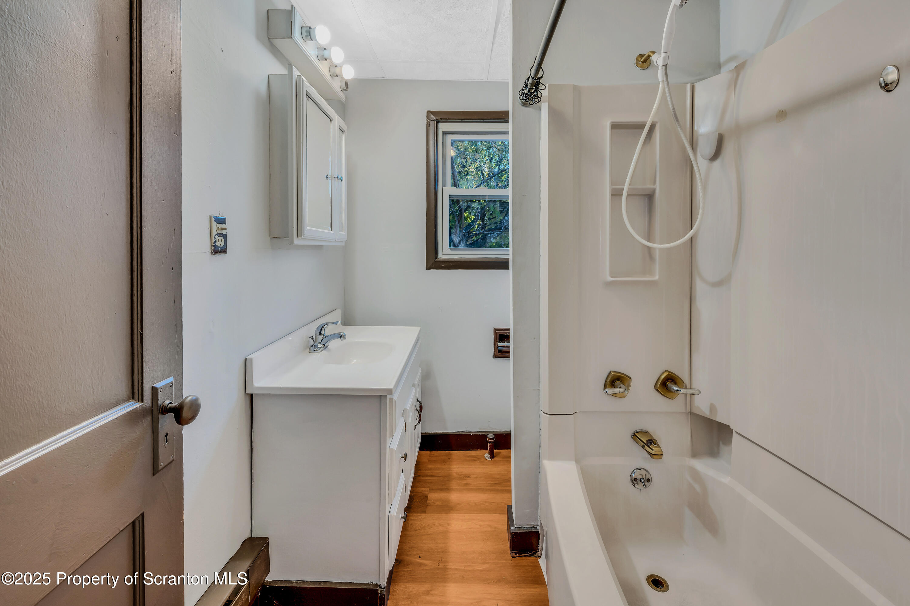 21 Stafford Avenue Scranton, PA 18505 - Photo 12 of 21 a bathroom with a sink a toilet and shower
