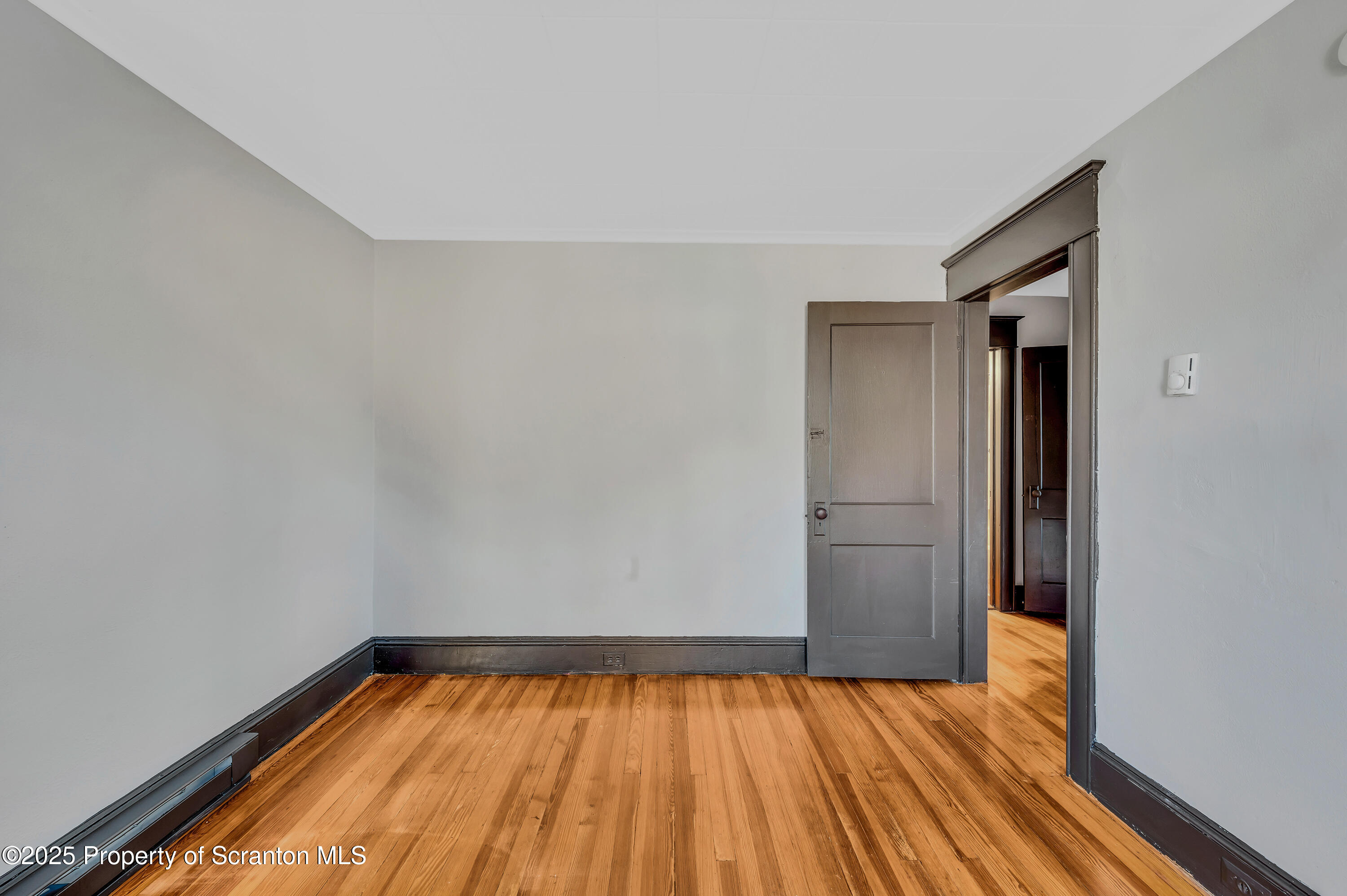 21 Stafford Avenue Scranton, PA 18505 - Photo 15 of 21 a view of a room with wooden floor and closet