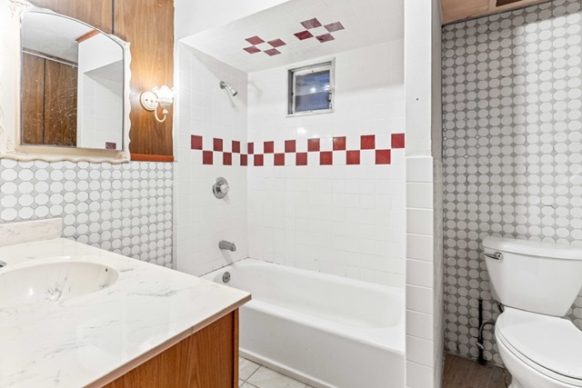 3047 South Broad Street Chicago, IL 60608 - Photo 14 of 15 a bathroom with a sink toilet and shower