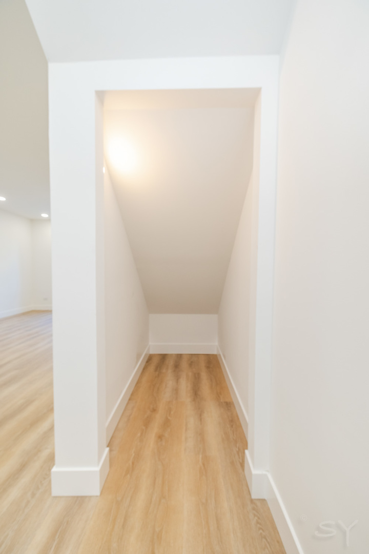 2949 West 25th Place, Unit 1 Chicago, IL 60623 - Photo 14 of 42 a view of a small space with wooden floor