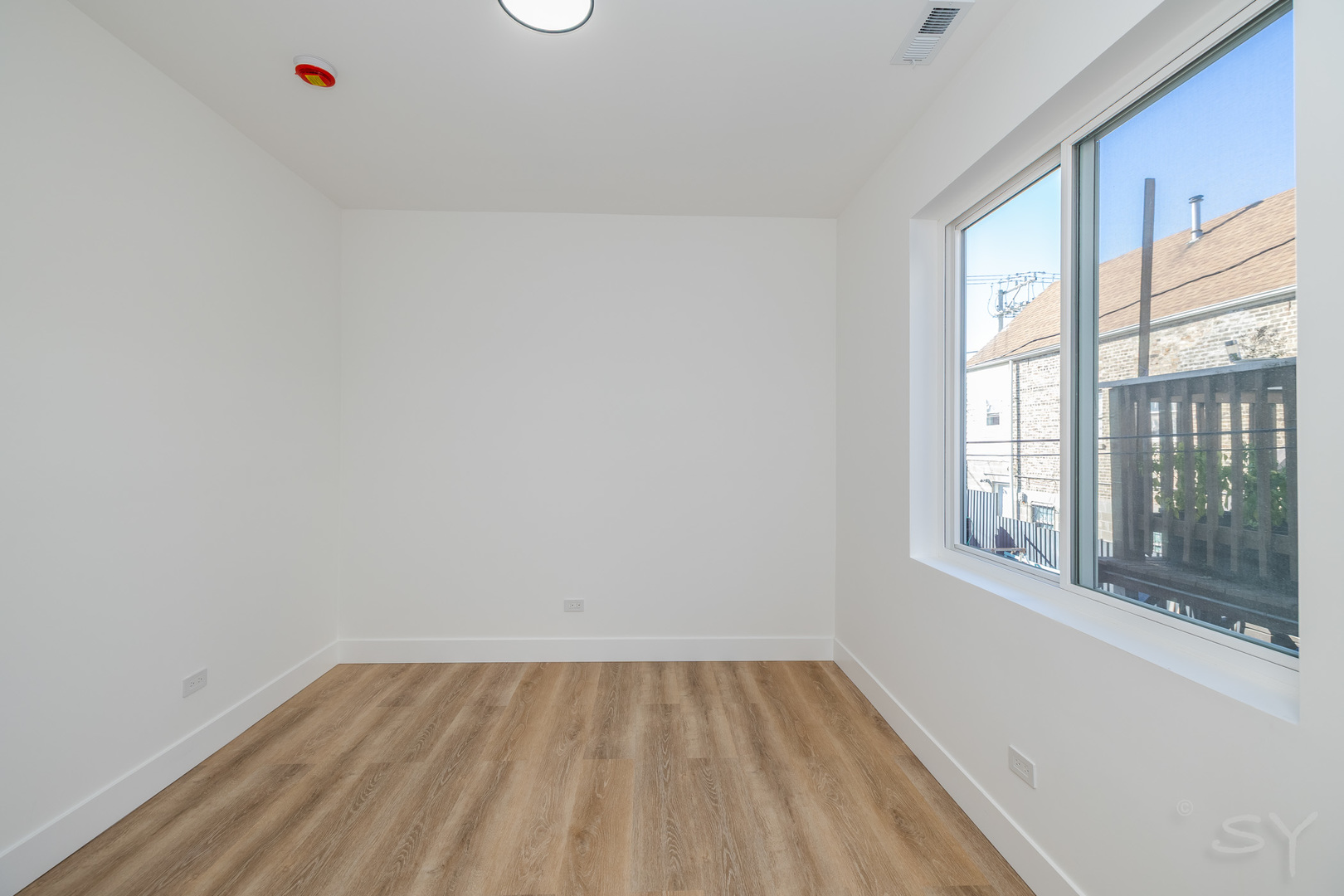 2949 West 25th Place, Unit 1 Chicago, IL 60623 - Photo 24 of 42 a view of a room that has a window