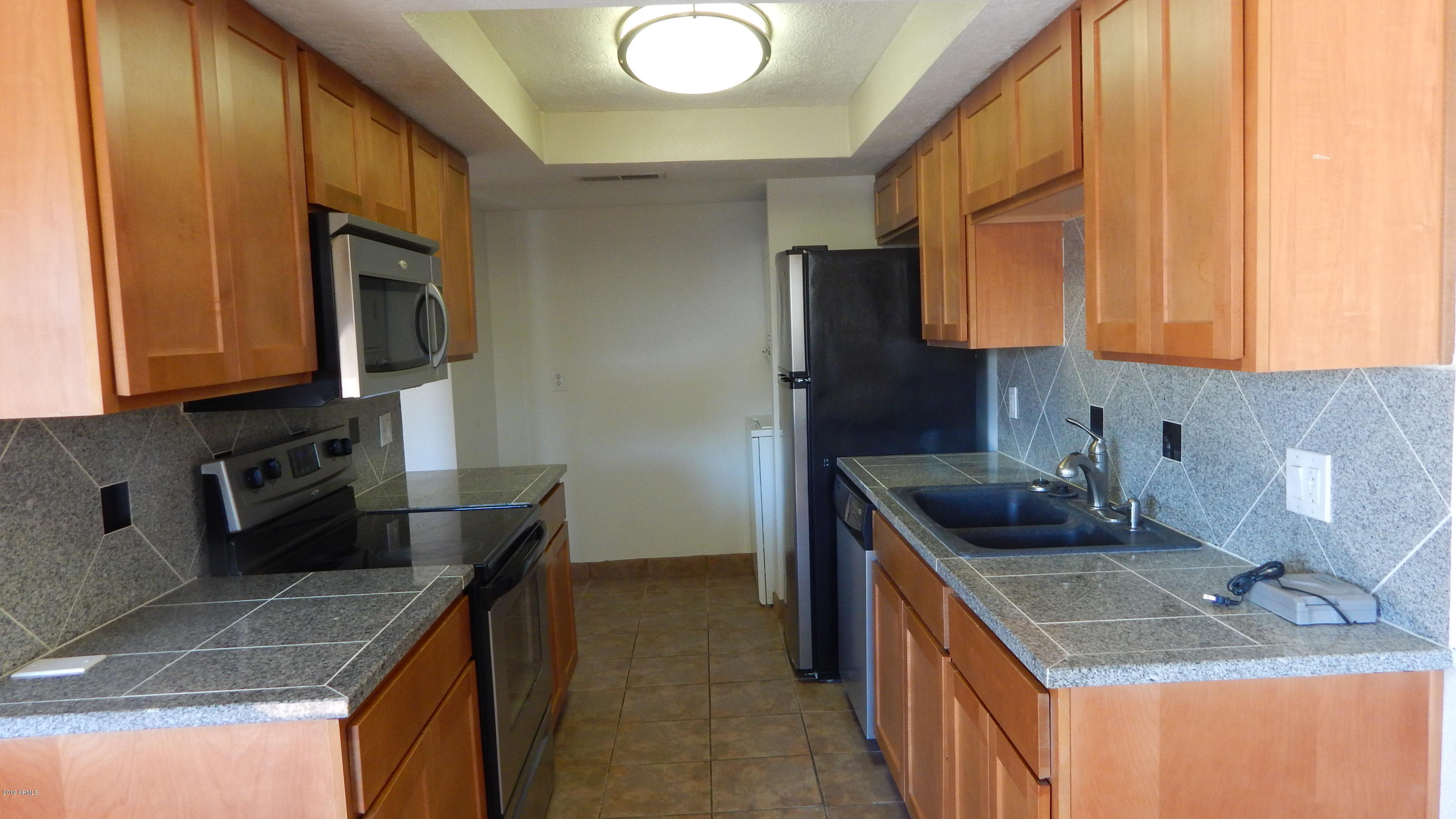 151 East Broadway Road, Unit 205 Tempe, AZ 85282 - Photo 5 of 26 Updated Kitchen