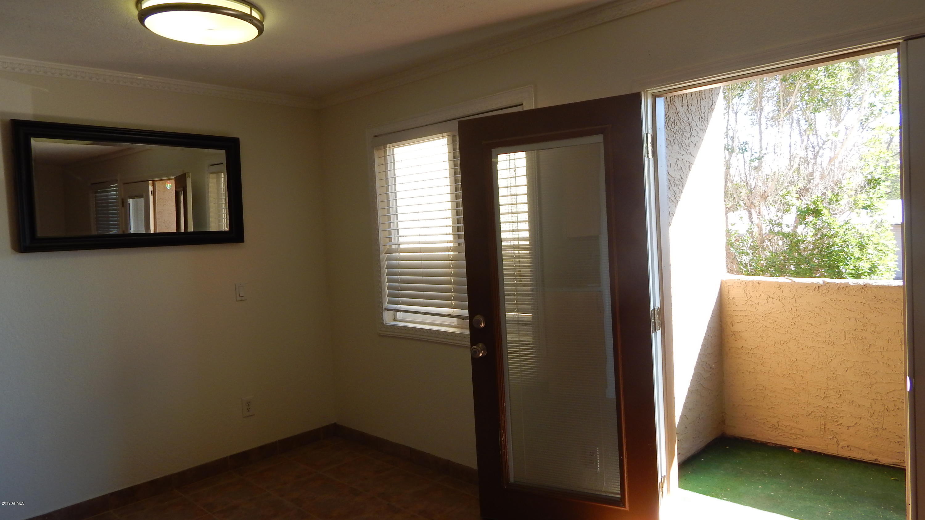 151 East Broadway Road, Unit 205 Tempe, AZ 85282 - Photo 6 of 26 Dining Area and Balcony