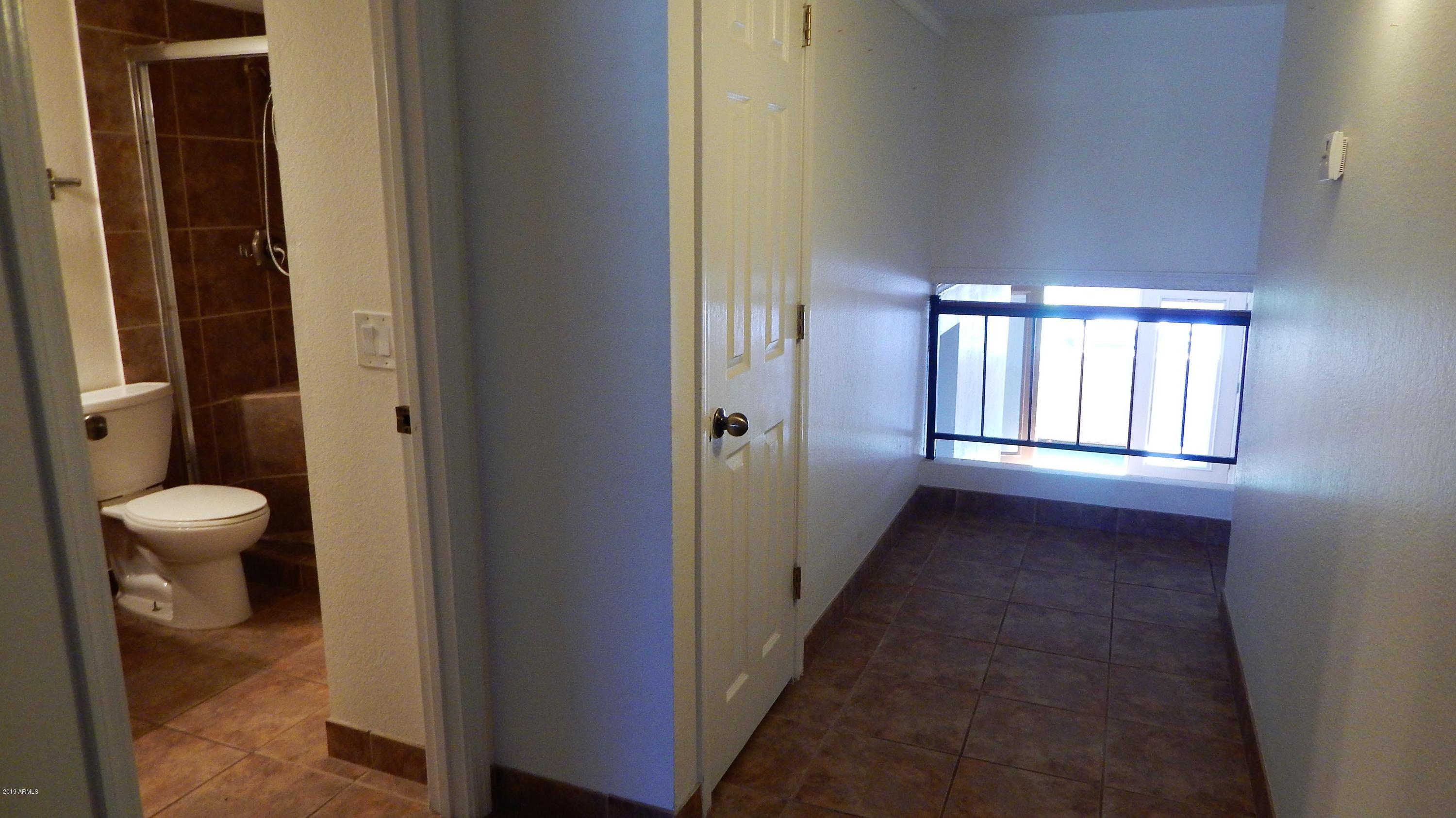 151 East Broadway Road, Unit 205 Tempe, AZ 85282 - Photo 8 of 26 Full Bathroom Hallway