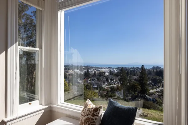 a view of balcony with furniture