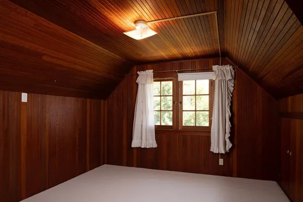 a view of a swimming pool with a yard