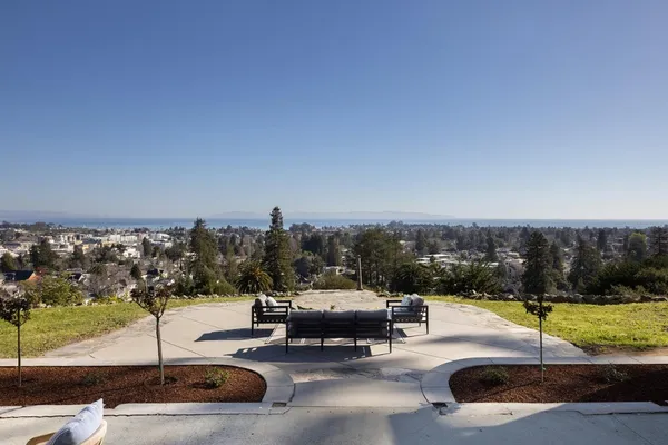 a backyard of a house with lots of green space