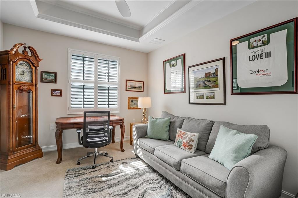 9350 Triana Terrace, Unit 292 Fort Myers, FL 33912 - Photo 19 of 28 a living room with furniture and a window