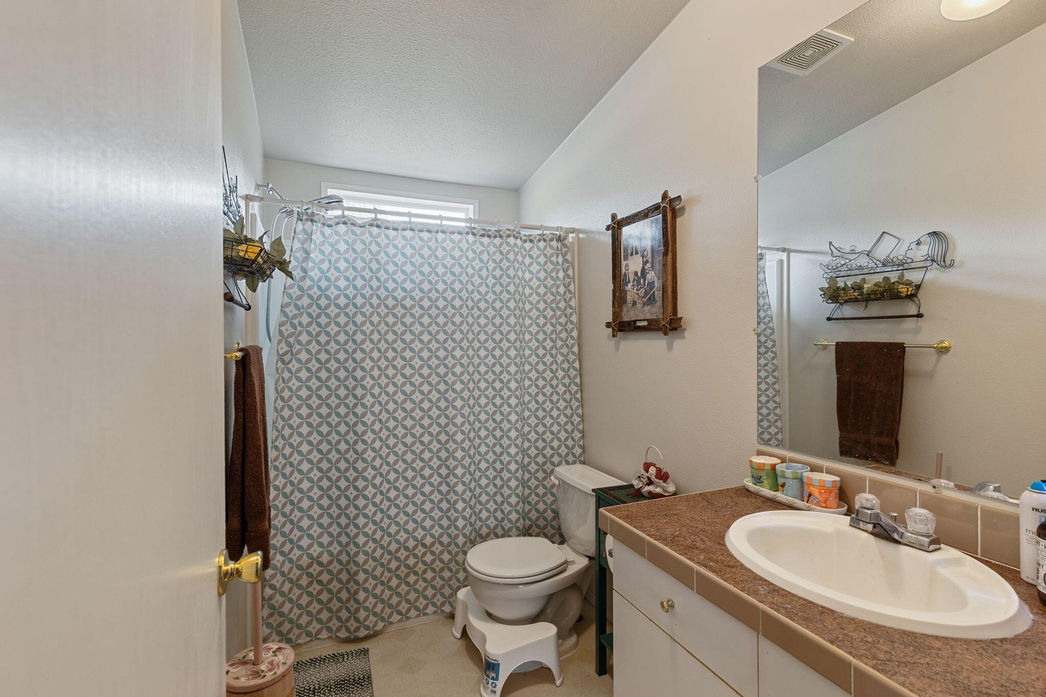 2040 Robertson Bridge Road Grants Pass, OR 97526 - Photo 15 of 39 a bathroom with a sink toilet and shower