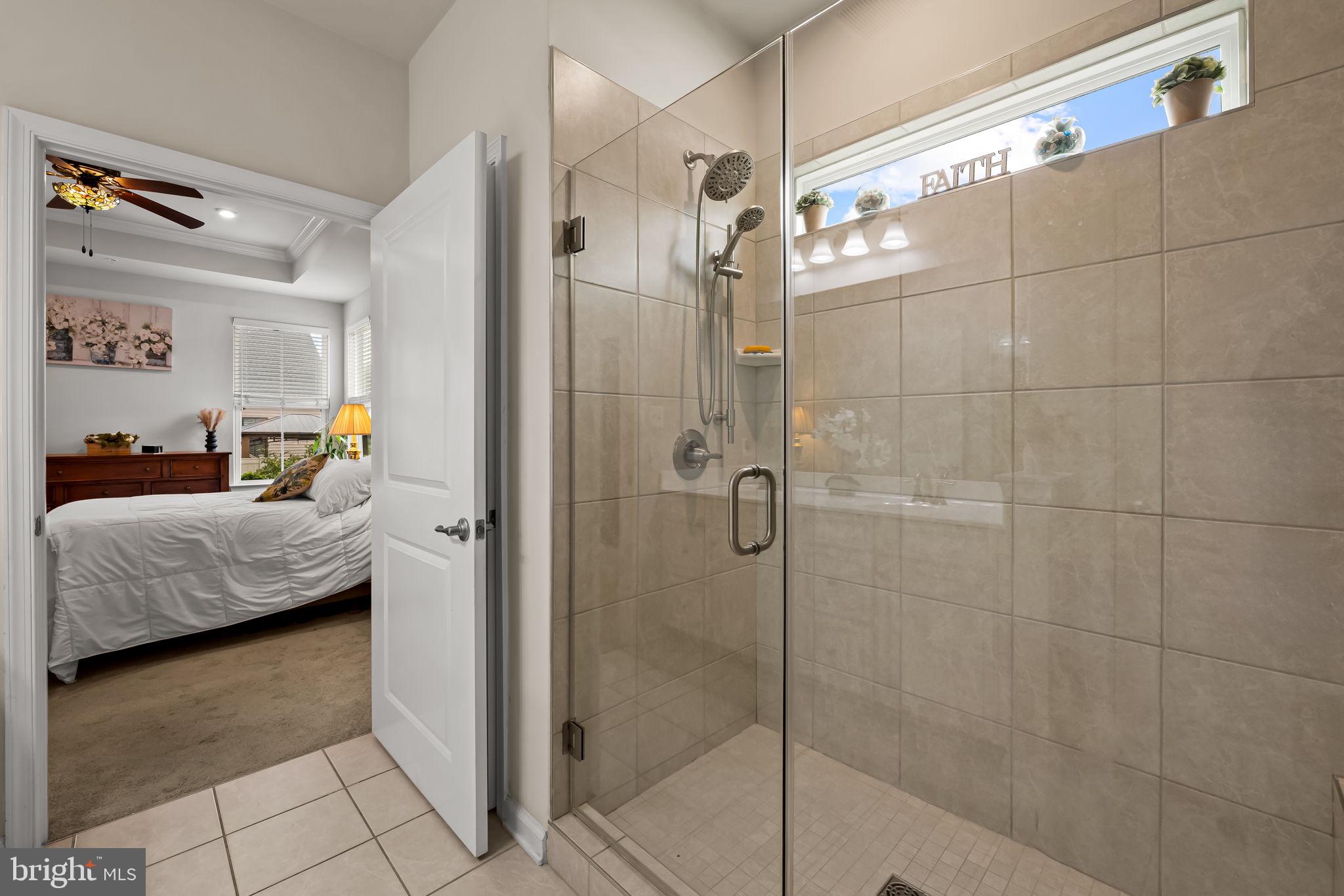 7728 Pestle Lane Glen Burnie, MD 21060 - Photo 23 of 66 a en suite bathroom with a shower