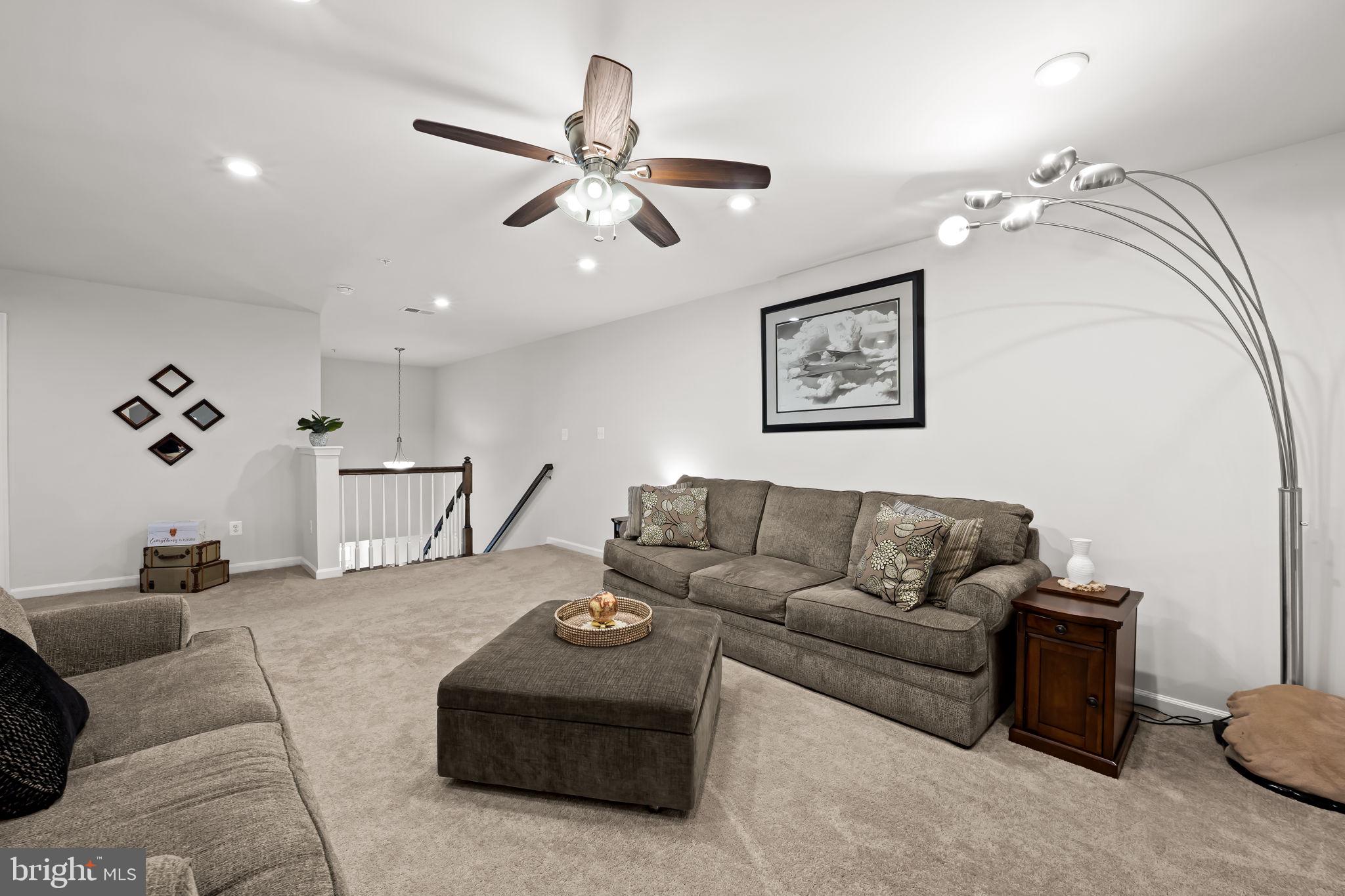 7728 Pestle Lane Glen Burnie, MD 21060 - Photo 26 of 66 a living room with furniture
