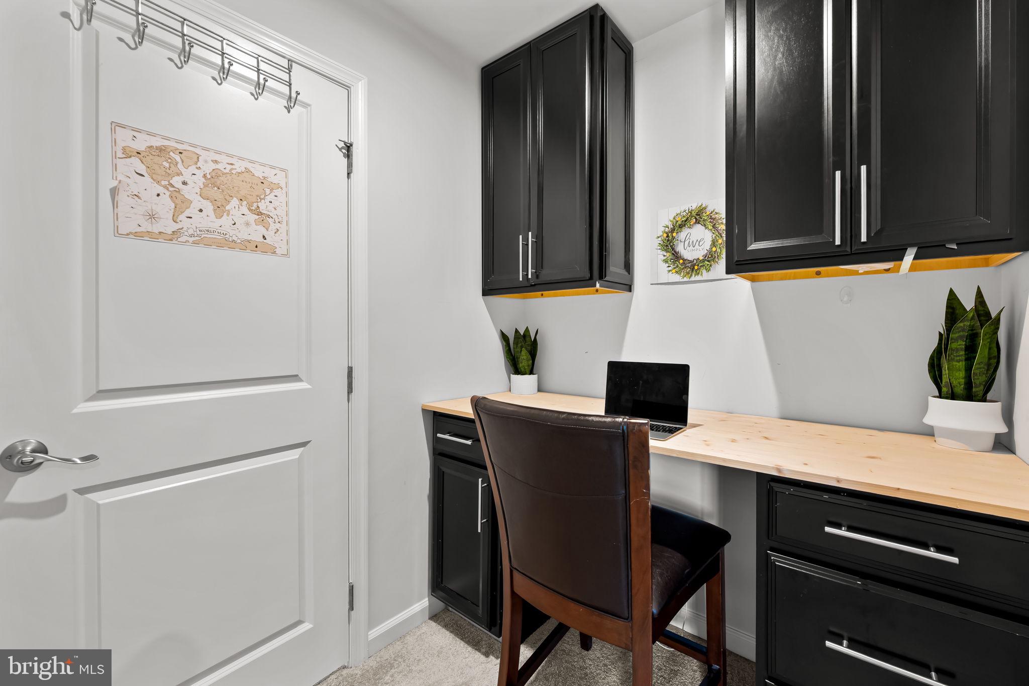 7728 Pestle Lane Glen Burnie, MD 21060 - Photo 36 of 66 a room with a table and chairs