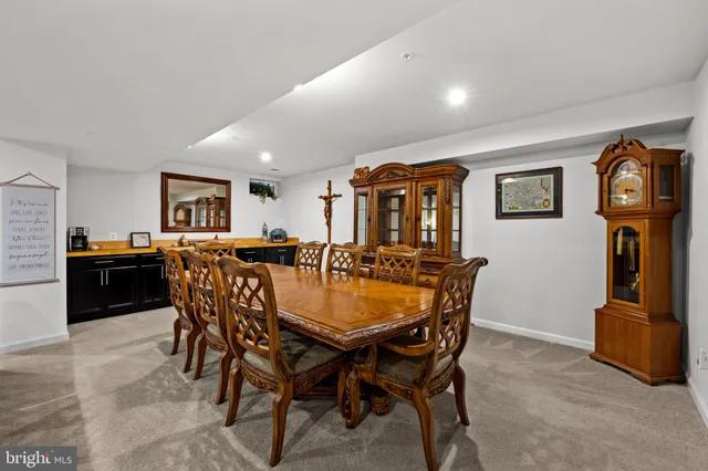 a view of a house with backyard porch and garden