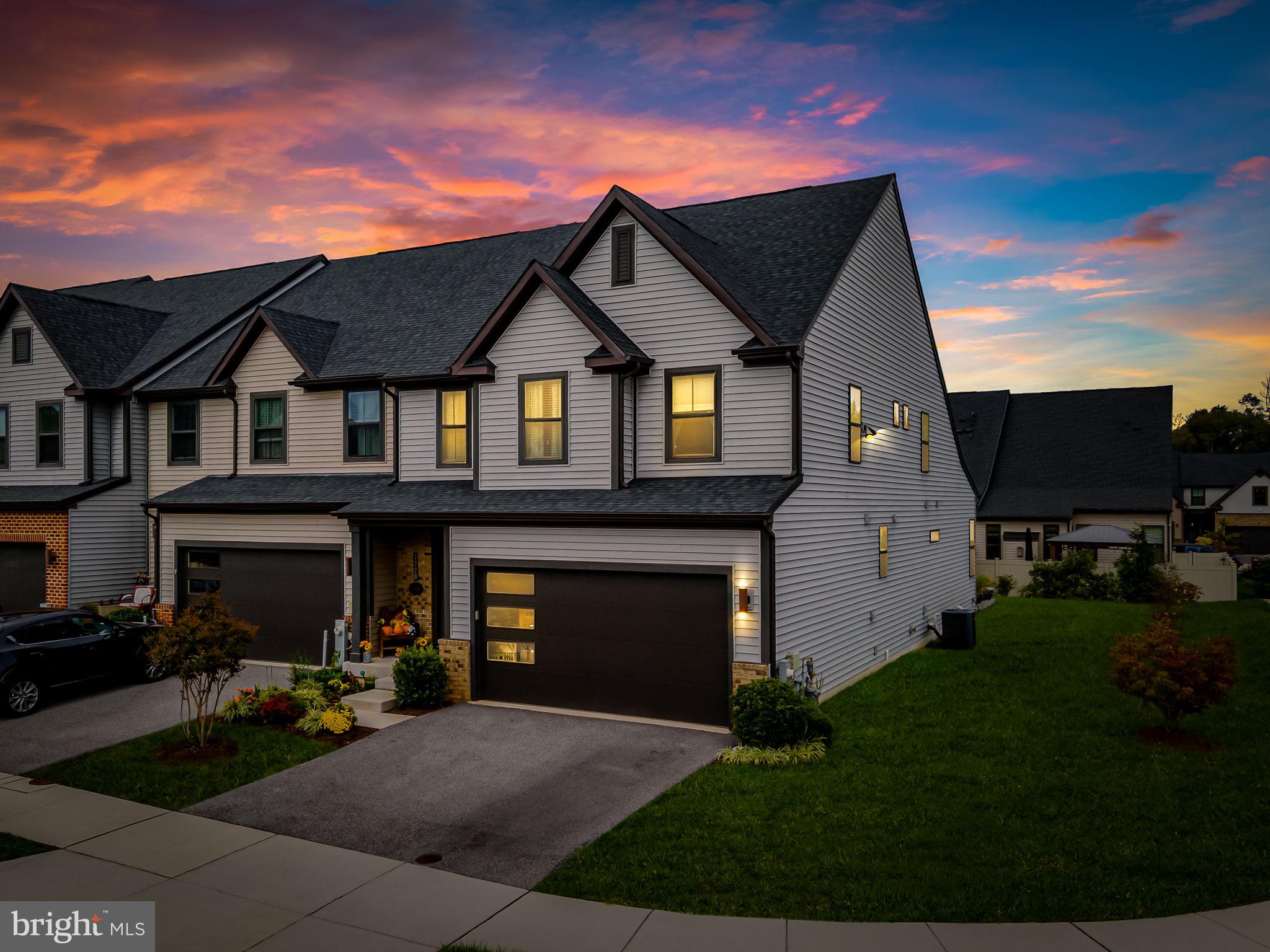 7728 Pestle Lane Glen Burnie, MD 21060 - Photo 4 of 66 a front view of a house with porch and garden