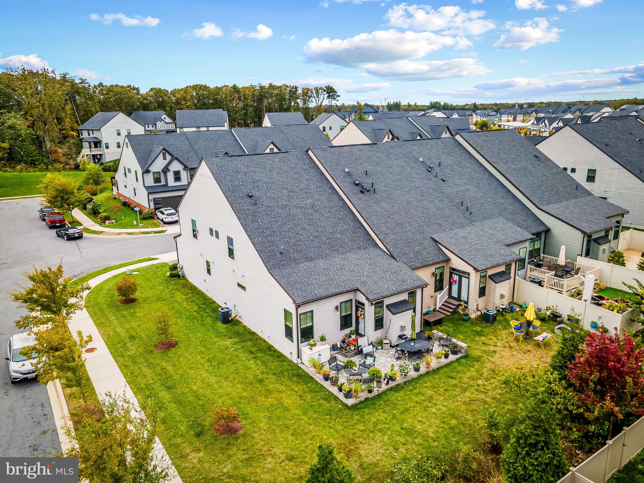 7728 Pestle Lane Glen Burnie, MD 21060 - Photo 49 of 66 an aerial view of residential houses with outdoor space and swimming pool