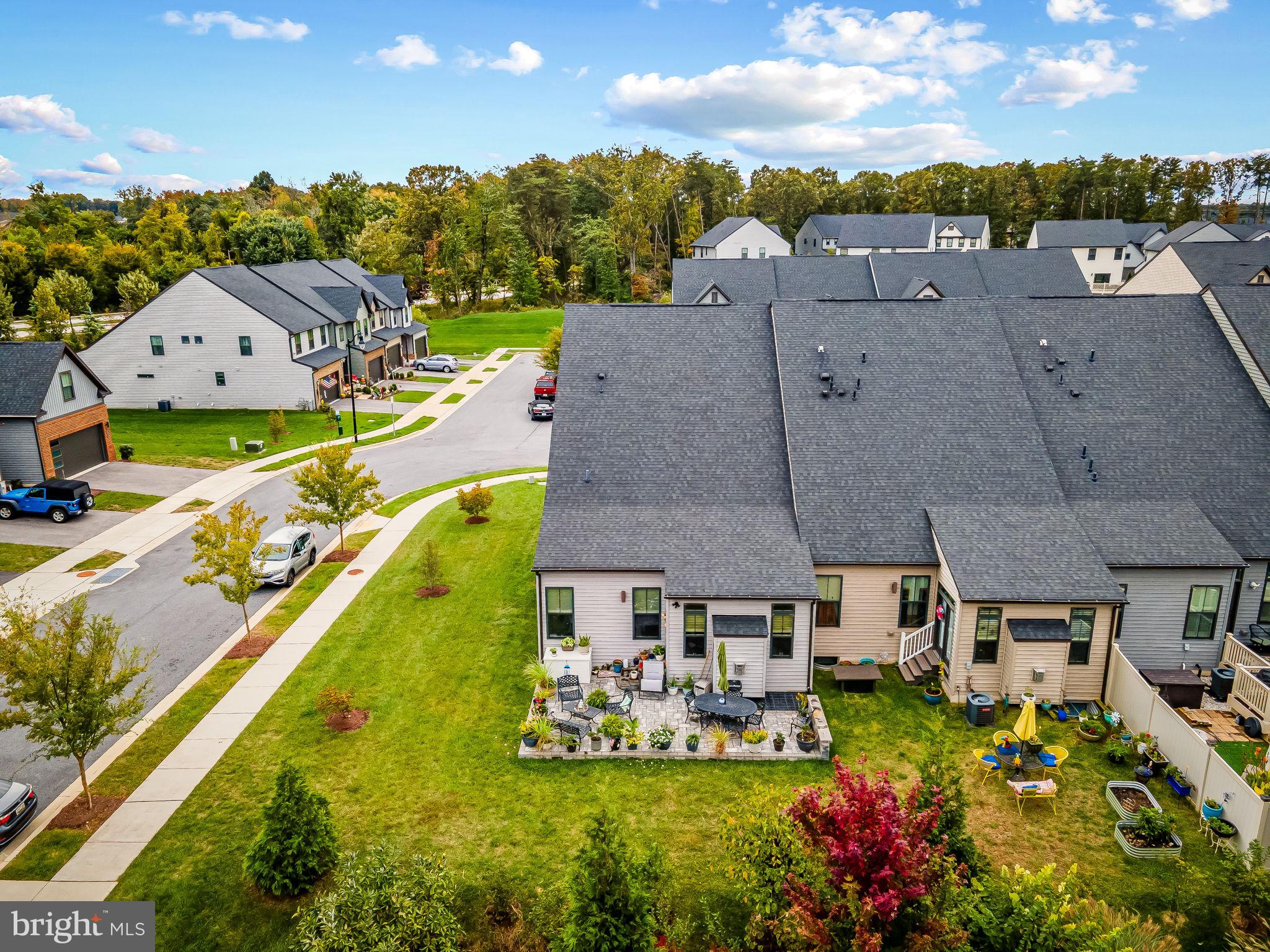 7728 Pestle Lane Glen Burnie, MD 21060 - Photo 50 of 66 an aerial view of a house with a garden and houses