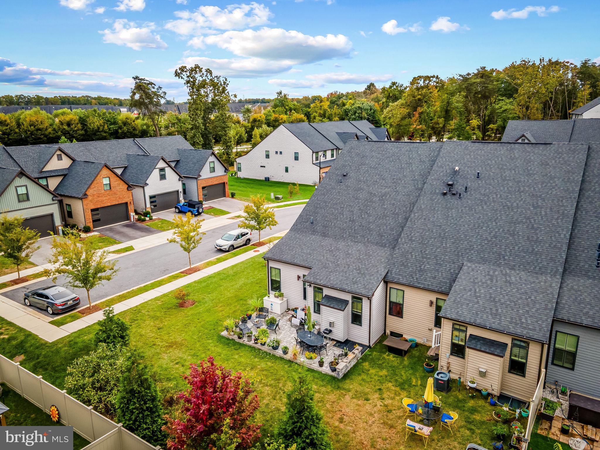 7728 Pestle Lane Glen Burnie, MD 21060 - Photo 51 of 66 an aerial view of a house with a garden and lake view