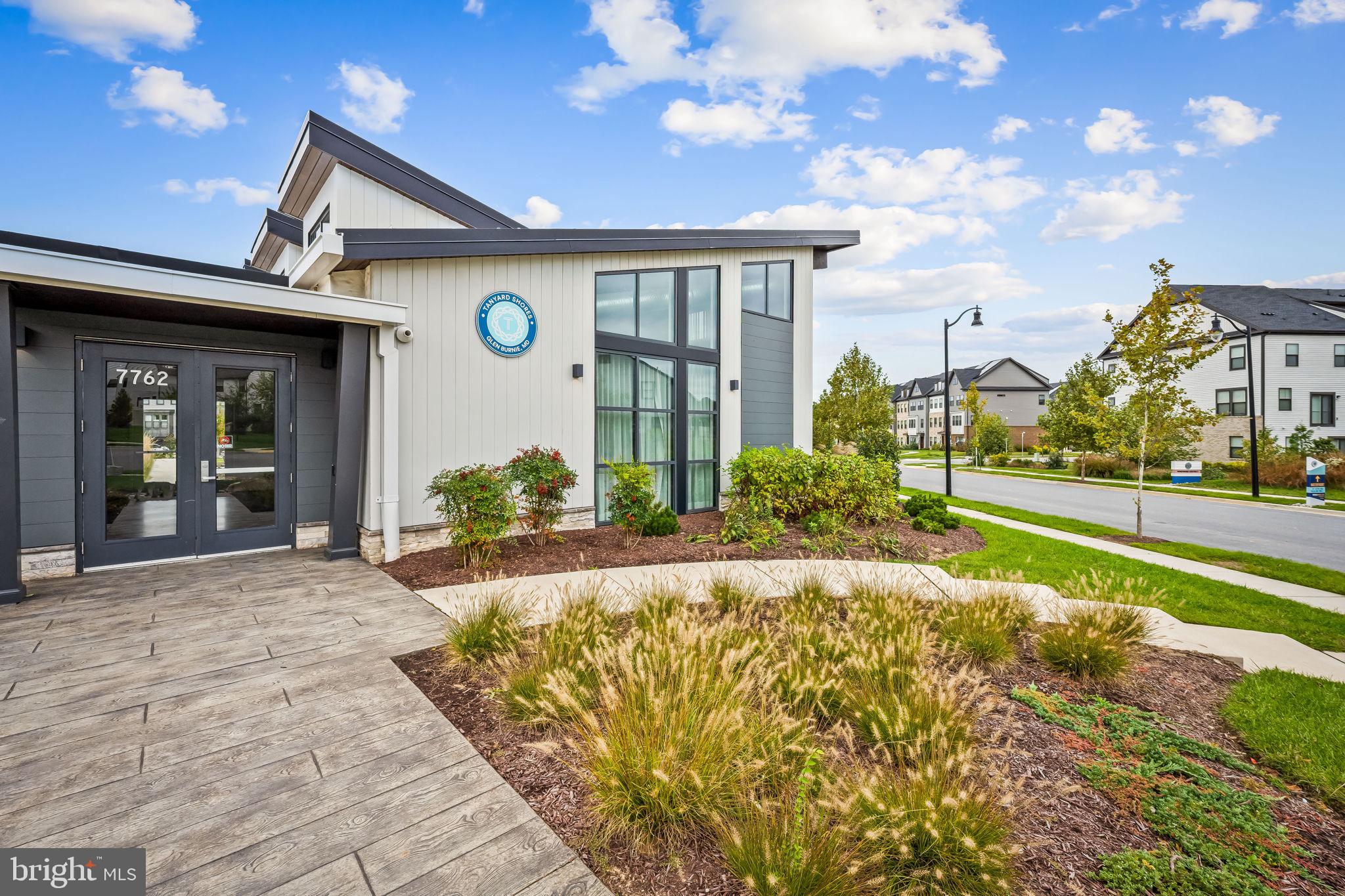 7728 Pestle Lane Glen Burnie, MD 21060 - Photo 59 of 66 a front view of a house with a yard
