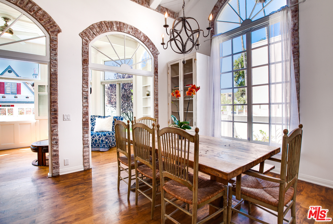 2327 Eastern Court Venice, CA 90291 - Photo 13 of 44 a view of a dining room with furniture window and wooden floor