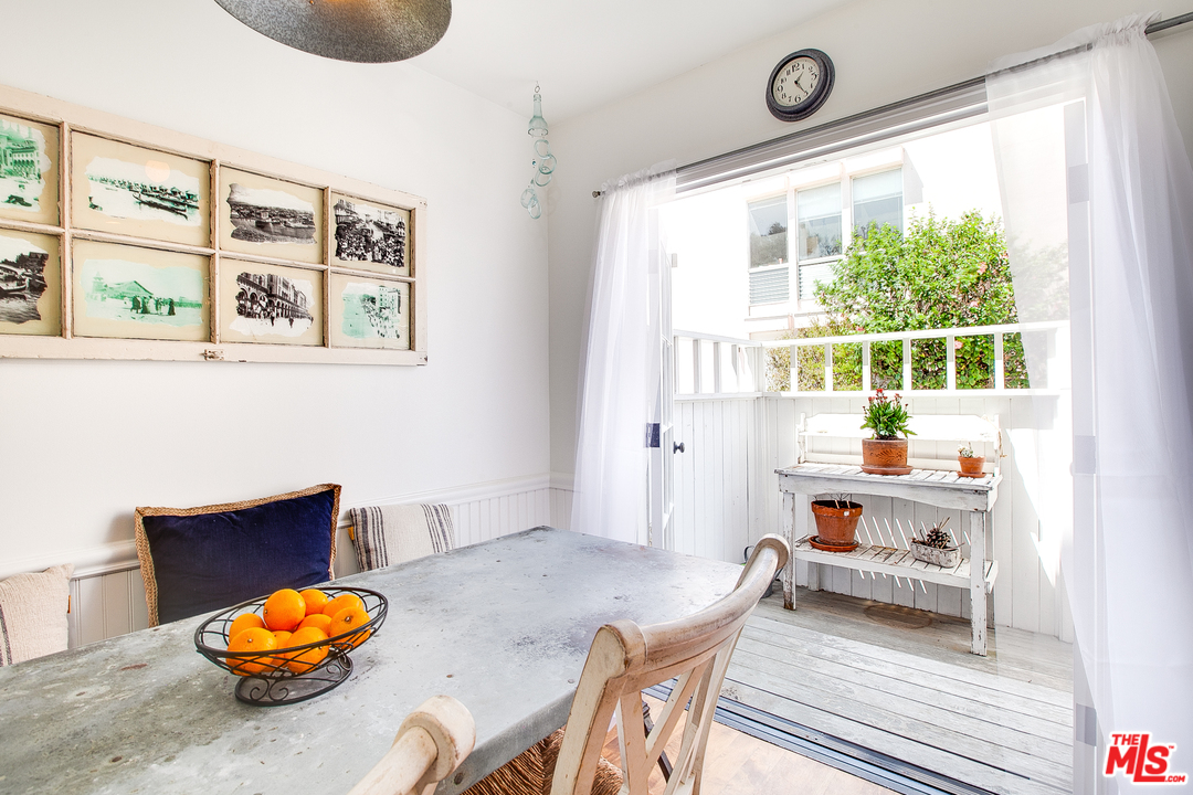 2327 Eastern Court Venice, CA 90291 - Photo 18 of 44 a living room with furniture and a large window