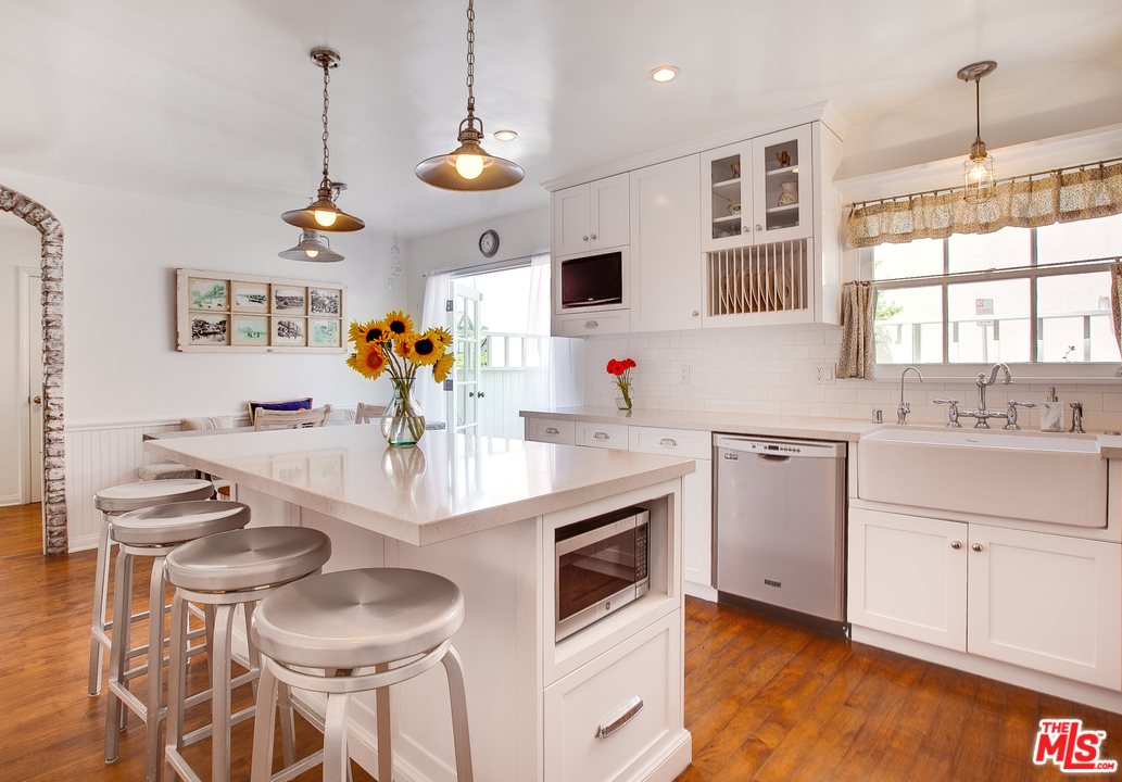 2327 Eastern Court Venice, CA 90291 - Photo 20 of 44 a view of a kitchen area with furniture and wooden floor