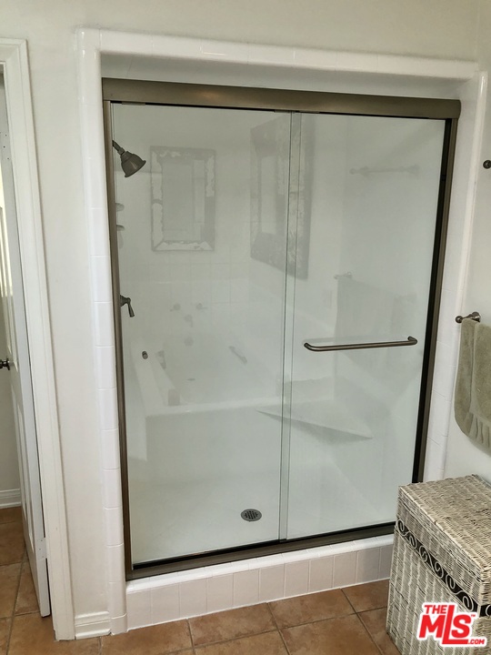 2327 Eastern Court Venice, CA 90291 - Photo 28 of 44 a bathroom with a glass shower door