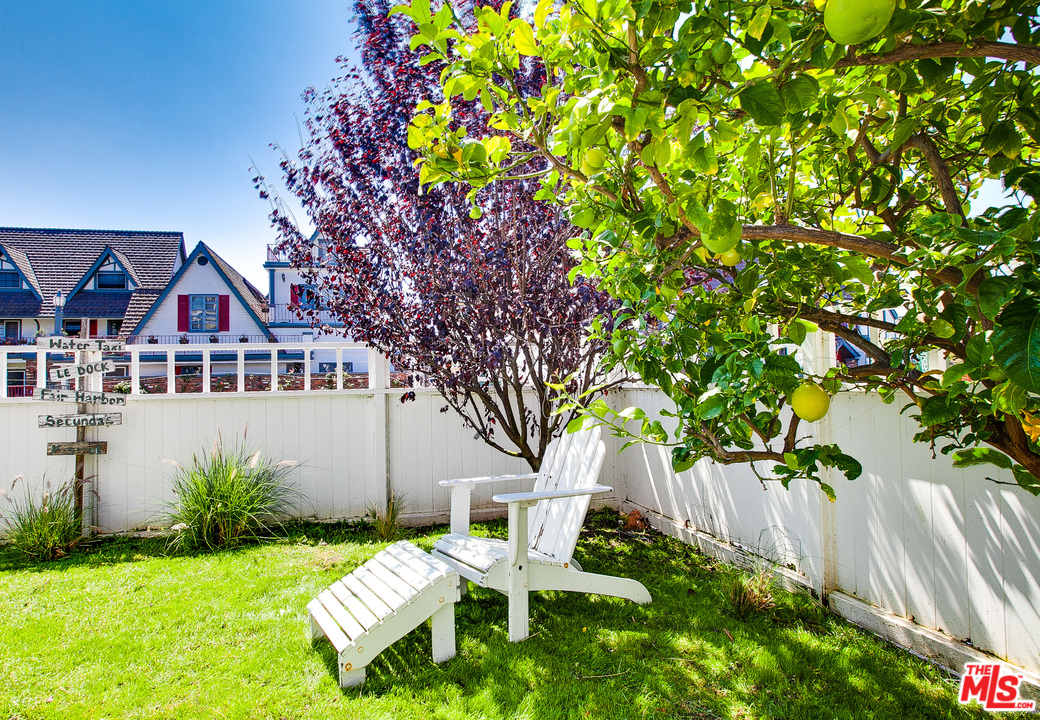2327 Eastern Court Venice, CA 90291 - Photo 42 of 44 a white house with a tree in front of it