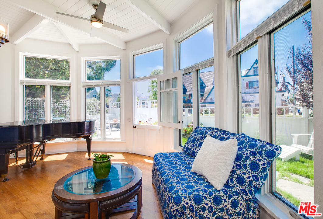 2327 Eastern Court Venice, CA 90291 - Photo 10 of 44 a living room with furniture and a large window