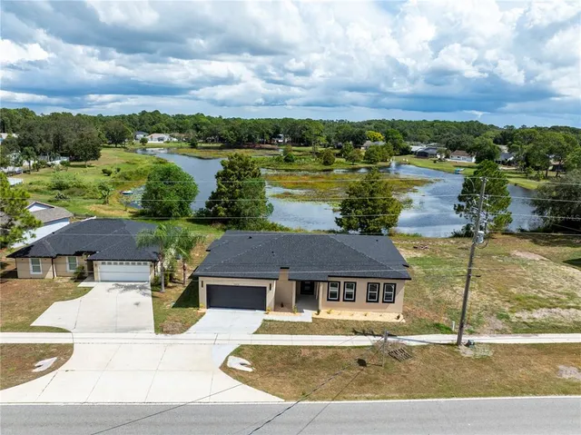 a view of a house with a ocean view