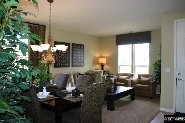 530 Seattle Slew Court Reno, NV 89521 - Photo 2 of 9 a living room with furniture and a potted plant